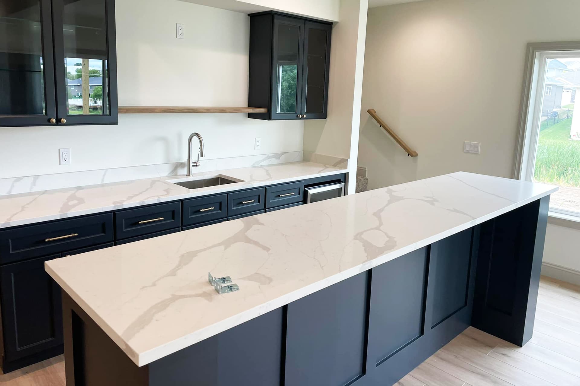 Elevate Your Space with Linnstone Quartz: Featuring Byron White and Calacatta Andes