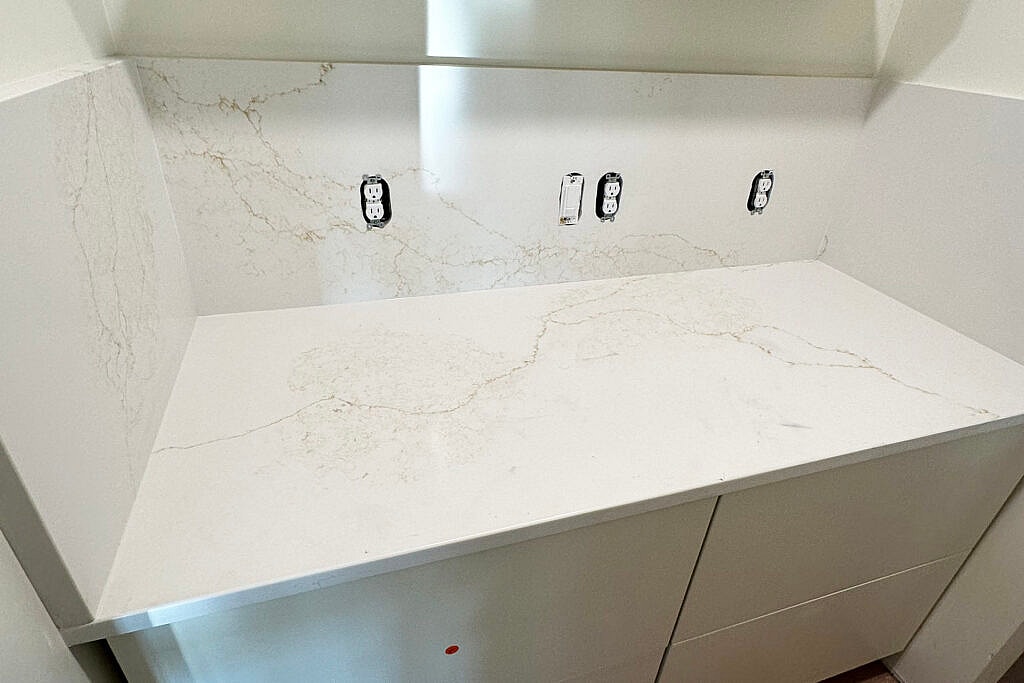 Desert Majesty in Calacatta Quartz: The Linnstone 5167 Sahara Ridge Experience 5 Linnstone Surfaces 5167 Sahara Ridge